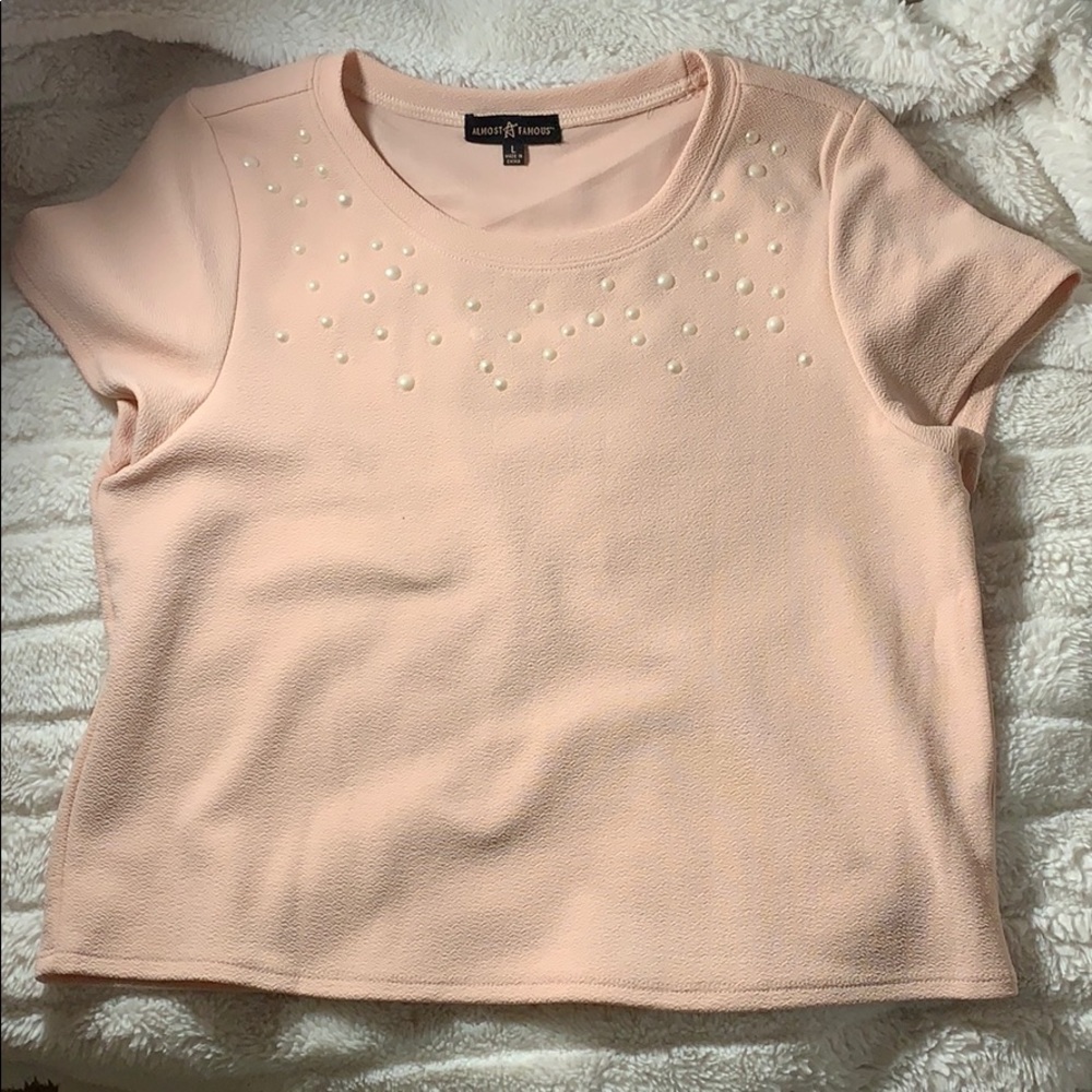 Cropped light pink pearled shirt